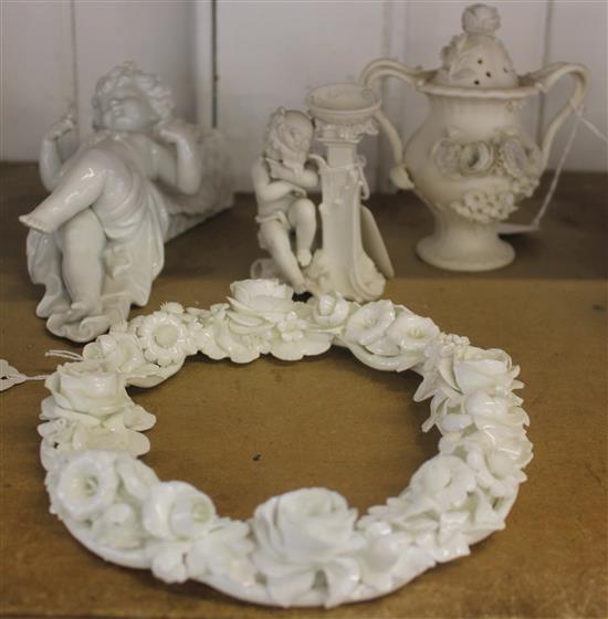 Blanc de chine cherub wall pocket, Belleek style encrusted oval frame, a Parian cherub & an Alcock pot pourri & cover (faults)